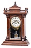 Welch, Spring & Co., Forestville, Conn., "Scalchi" mantel clock with an 8 day spring driven time and strike with "Patti"-style movement in a polished black walnut case.