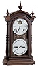 Seth Thomas Clock Co., Thomaston, Conn., "Fashion No. 5", 8 day, time and strike spring driven brass movement (with seconds bit) double dial calendar clock in a walnut case.