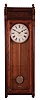 E. Howard & Co., Boston, Mass., "Regulator No. 58" wall hanging clock with a weight driven 8 day timepiece movement in a cherry case.