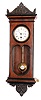 German, (Unsigned, possibly Lenzkirch) , 8 day, spring brass movement in a small inlayed mahogany with ebonized trim wall timepiece.