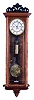 L.L. Hurst, Centennial, Colorado, Vienna regulator wall clock, a period Austrian made 8 days, time, strike and 1/4 chime, single brass weight and double spring driven movement with sweep seconds in mahogany and other figured woods case and a white enamel two part dial with cast brass pie crust bezel. Signed L.L. Hurst and dated on back by maker, 2006