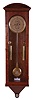 Leland Hurst, Centennial, CO, 8 day, weight-driven brass movement double pendulum Astronomical dial wall timepiece. Mr. Hurst built five of these cases. The movement was built by a Mr. Don Schaffer.