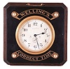Waltham, "Wellings Correct Time" counter display clock, square, mahogany case with sloping top, black Bakelite top with chamfered edge, mounted with plaques marked "Wellings" and "Correct Time", framing the gilt bezel and silvered, Arabic numeral dial with wind indicator, 8 day timepiece movement