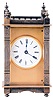 Boston Clock Co., Boston, Mass., "Queen Anne" model carriage clock, silvered brass case, Roman numeral white enamel dial with gilt mask, 8 day timepiece movement