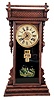 William L. Gilbert Clock Co., Winsted, Conn., "Oriental", 8 day, time and strike spring brass movement calendar shelf clock.
