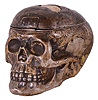 Desk clock, skull form case made of carved bone and silver, the hinged top concealing a key wound lever fusee watch movement with Roman numeral gold dial, set in an engraved silver surround