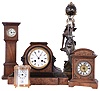 Clocks- 5 (Five): French wood 8 day time and strike tambour with Marti movement; ProClocks modern brass and glass 8 day time and alarm carriage; U.S.A. miniature 30 hour time only inlaid mahogany miniature tall clock; German walnut small time and alarm 30 hour bracket; and "Le Jour par A. Cadet" figural with swinging arm, also a modern Asian reproduction.