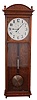 Seth Thomas Clock Co., Thomaston, Conn., "Regulator No. 20", jeweler's regulator wall clock, 8 day, time only, brass weight driven movement in an oak case with a painted metal dial