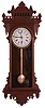 E. N. Welch Mfg. Co., Forestville, Conn., "Eclipse" wall hanging clock with a spring driven 8 day timepiece movement with a simple calendar mechanism in a walnut case.