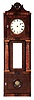 Hanging reproduction "coffin" clock with tiger maple columns and period 8 day weight-driven banjo clock movement, attributed to Frazer Forgie, Fryeburg, Maine.