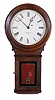 E. Howard & Co., Boston, Mass., "Regulator No. 70" wall hanging clock with a weight driven 8 day timepiece movement in a walnut case.
