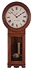 Seth Thomas Clock Co., Thomaston, Conn., "Regulator No. 2" wall hanging clock with a weight driven 8 day timepiece movement in a oak case.