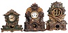 Clocks- 3 (Three) Metal Front Mantel: one painted iron front by F. S. Otis, Forestville, CT; two spelter front by Nicholas Muller (No. 163 "Study" and No. 54 "Eagle") , New York, NY. 8 day time and strike movements; c1870