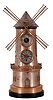 France, industrial series, The Windmill , the gilt and silvered brass case with black slate base, mid section with pierced railing, lower section with two simulated windows flanking a door, the door opening to access the windmill movement winding arbor, front with 8 day timepiece and barometer, the sides with farenheit and centigrade thermometers, c1880