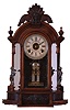 Ansonia Clock Co., New York, NY, "Triumph" mirror side shelf clock with a spring driven 8 day time and strike movement in a walnut case.