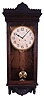 Waterbury Clock Co., Waterbury, Conn., "Postal" wall hanging clock with a spring driven 8 day time and strike movement in an oak case.