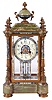 France, fancy crystal regulator mantel clock, 8 days, time and bell strike, spring driven movement in a green onyx and cloisonne case with four enameld full columns flanking dial and rear door, enamel and onyx urn finial, cloissone mercury pendulum, cloisonne floor inside clock visible through beveled glasses and resting on cast brass feet. The brass dial has matching cloisonne bezel and dial insert and painted polychrome floral festoons..