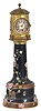 Burslem, England, Doulton lighthouse form clock case with French movement, the black Chine case with luster bands and chrysanthemum decoration, ogee molded brass cap with pierced brass railing, lighthouse top with ribbed dome and finial, mounted with barometer, thermometers, and 8 day timepiece movement with cylinder escapement, Roman numeral silvered dial with blued steel distaff style hands, barometer with blued steel hand and gilt set hand, base marked "Doulton Burslem" in green below a crown, impressed "Doultons" and "Doulton & Slaters patent", stamped "U.S. Patent 314002", and with over glaze initials in script "WBJ", c1890