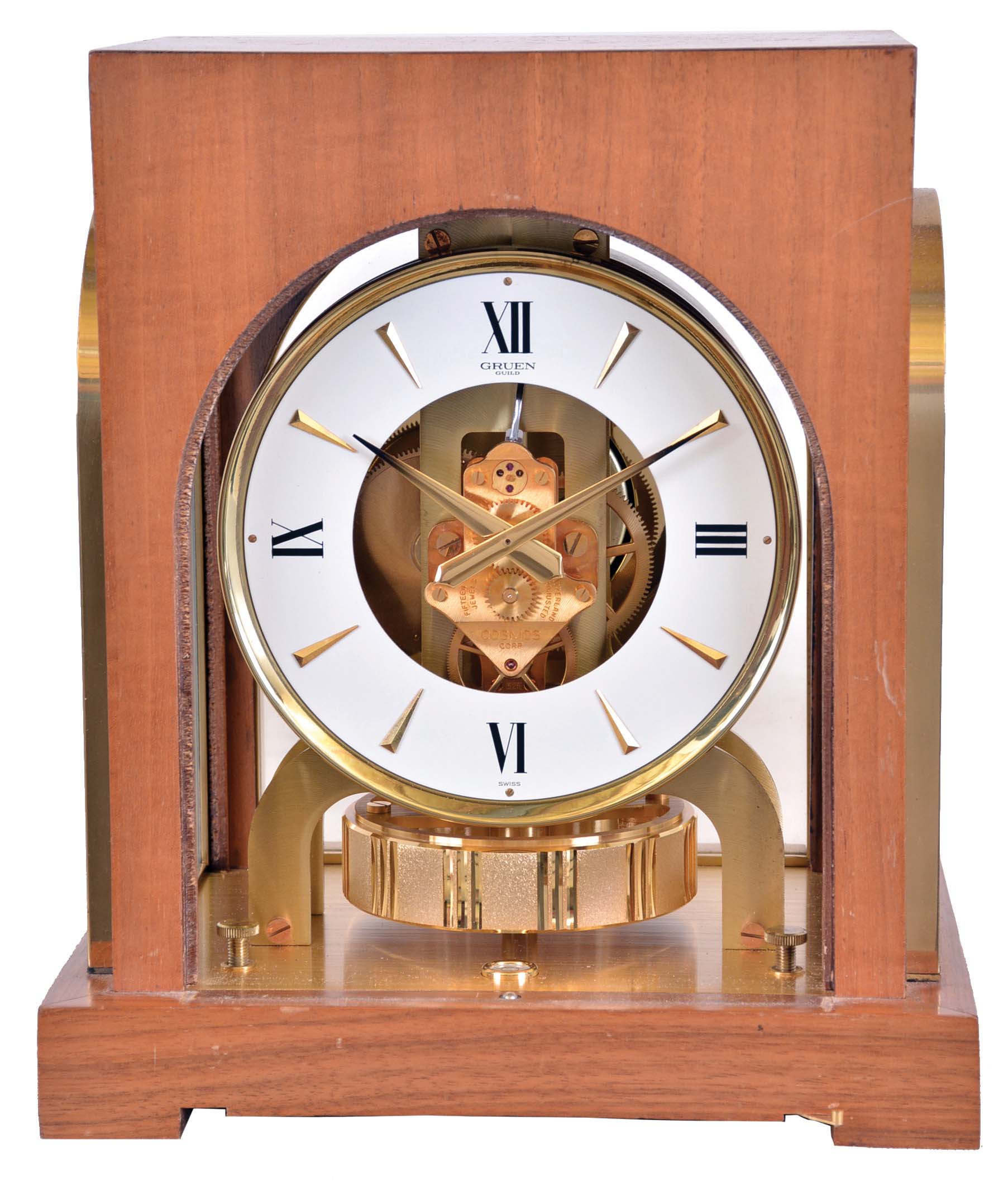 LeCoultre &amp; Cie, Switzerland, for Gruen Guild / Cosmos Corp. "Atmos" clock, 15 jewel gilt caliber 528 movement, gilt torsion pendulum, round white painted dial with painted Roman numerals and gilt arrow markers, gilt hands with black tips, contained in a walnut veneered case with glazed, arched gilt frames — Antique Clocks Price Guide