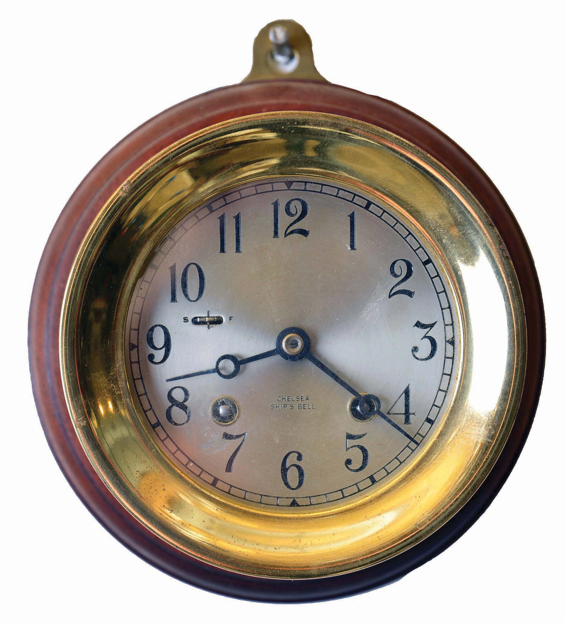 Chelsea Clock Co., Boston, Mass., "Commodore", 4- Inch dial, 8 day, spring brass movement time and strike Ship's Bell clock. Serial No. 608041 — Antique Clocks Price Guide