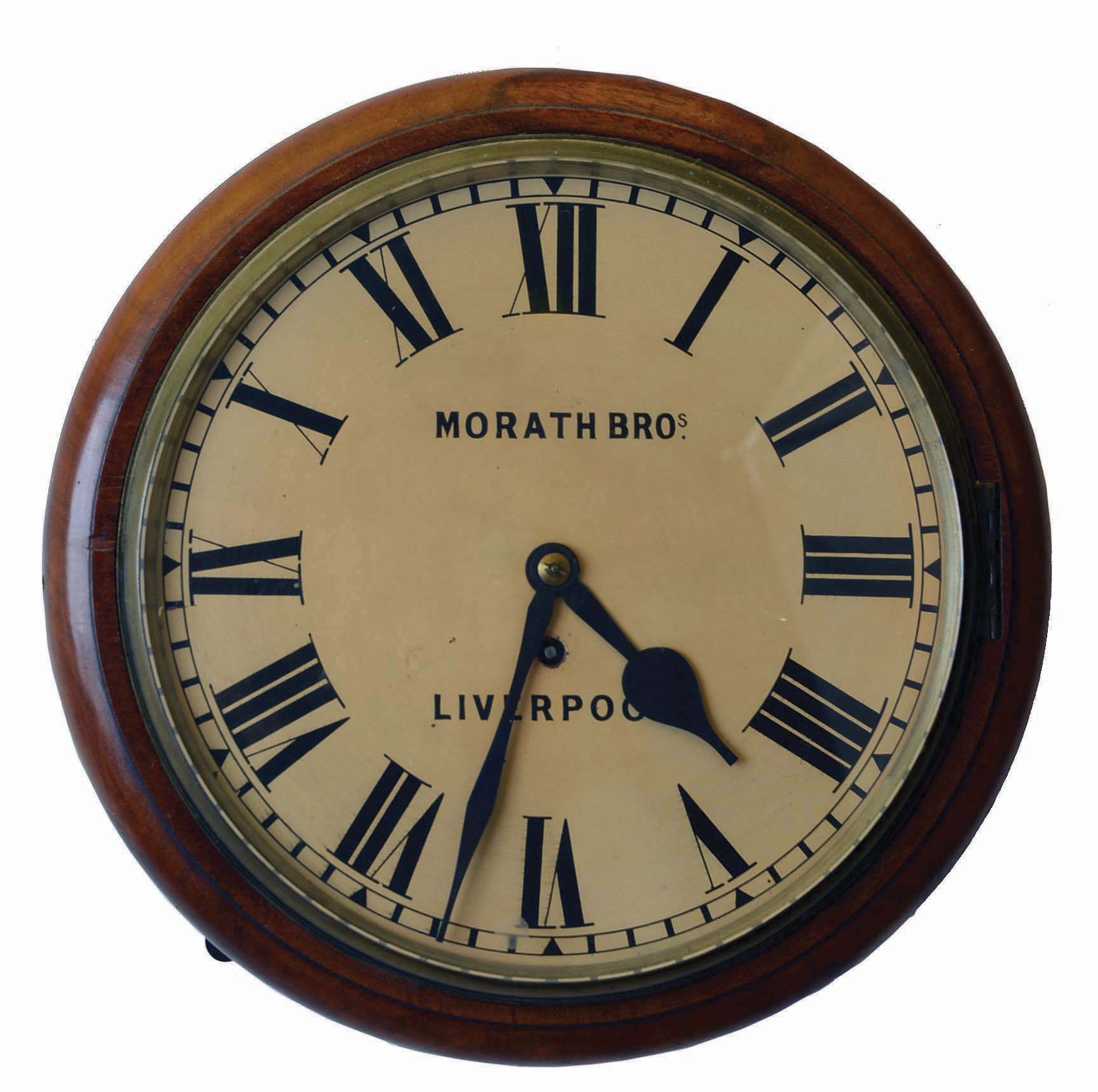 English, 8 day, spring fusee brass movement gallery clock sold by Morath Brothers, Liverpool, England. — Antique Clocks Price Guide