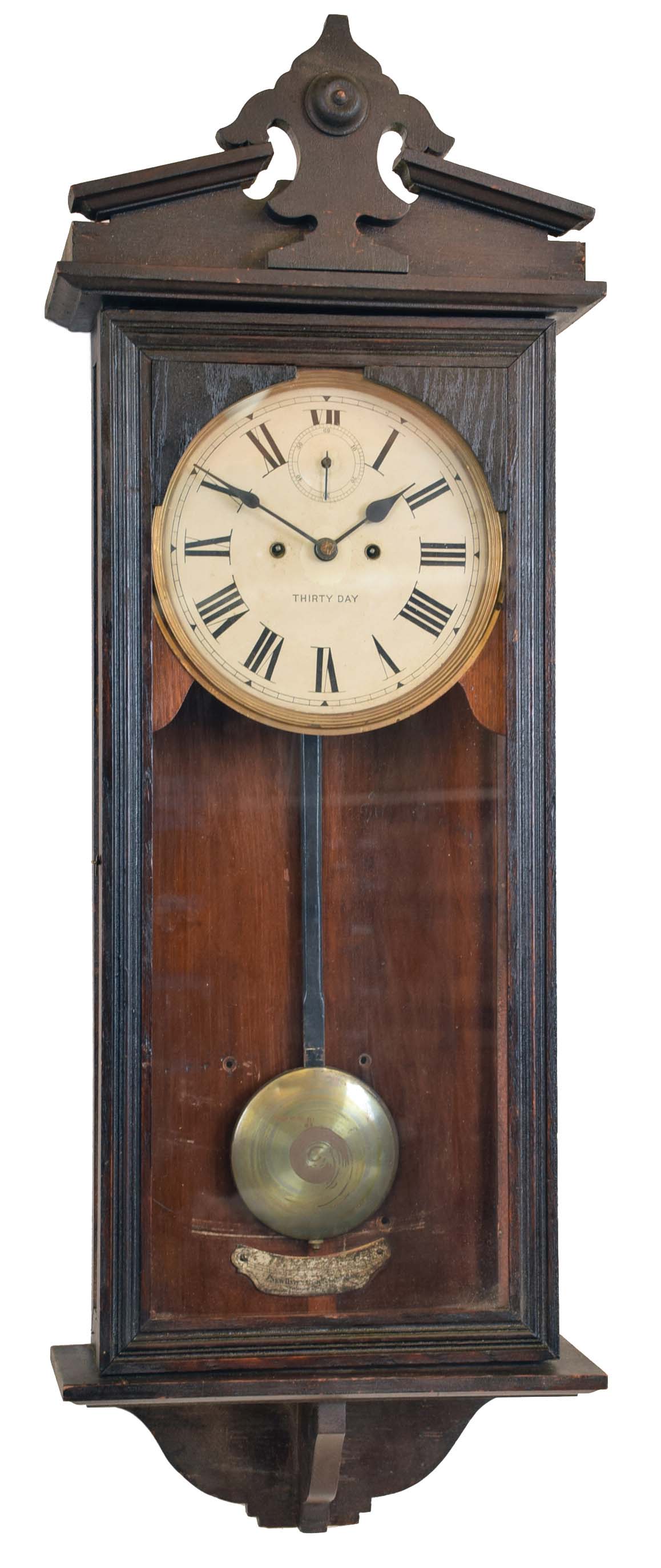New Haven Clock Co., New Haven, Conn., "Vamoose" wall hanging clock with a 30 day spring driven brass timepiece movement in an oak case, — Antique Clocks Price Guide