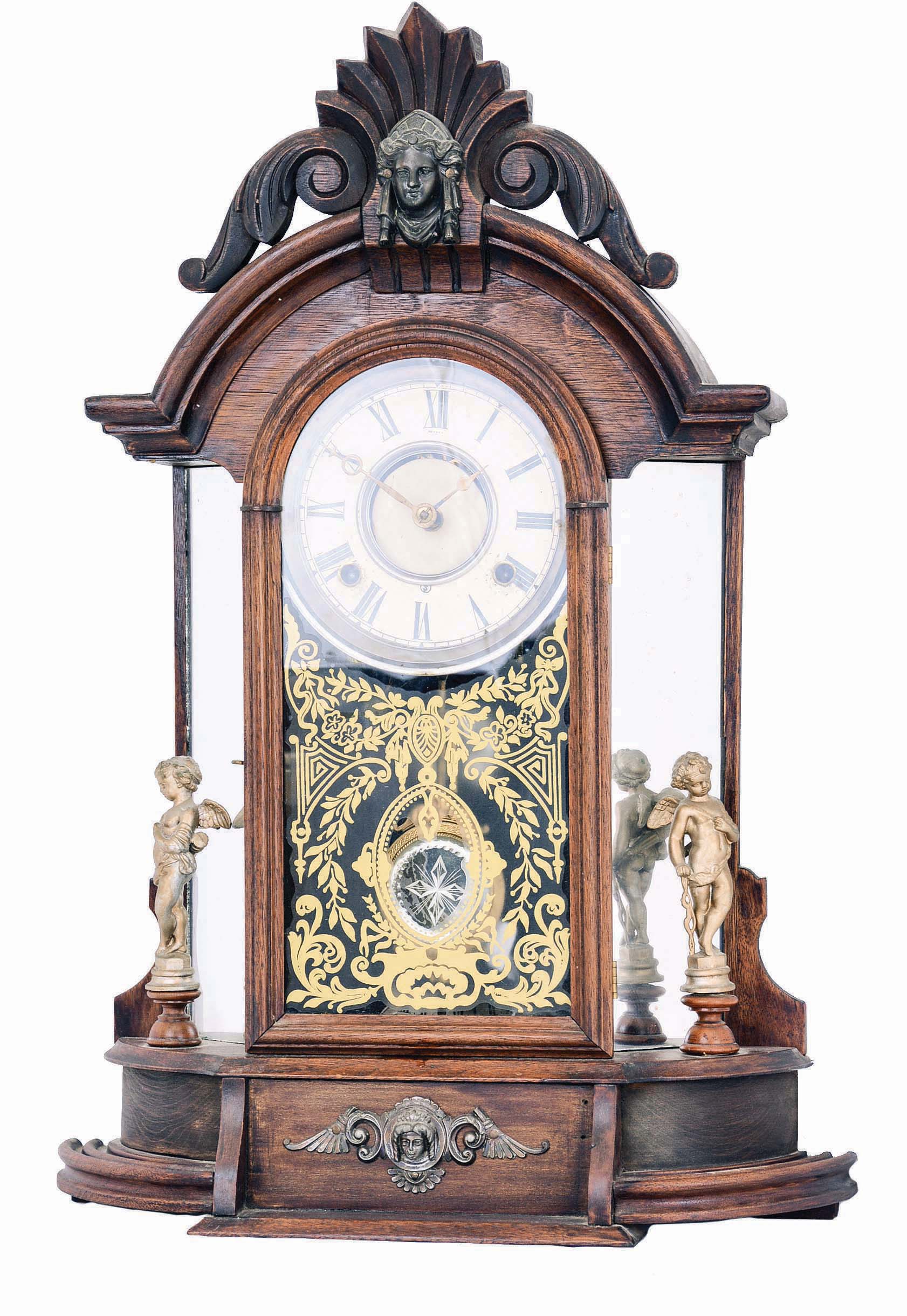 Ansonia Clock Co., New York, NY, "Triumph" mirror side shelf clock with an 8 day, spring driven time and strike brass movement in a walnut case. — Antique Clocks Price Guide