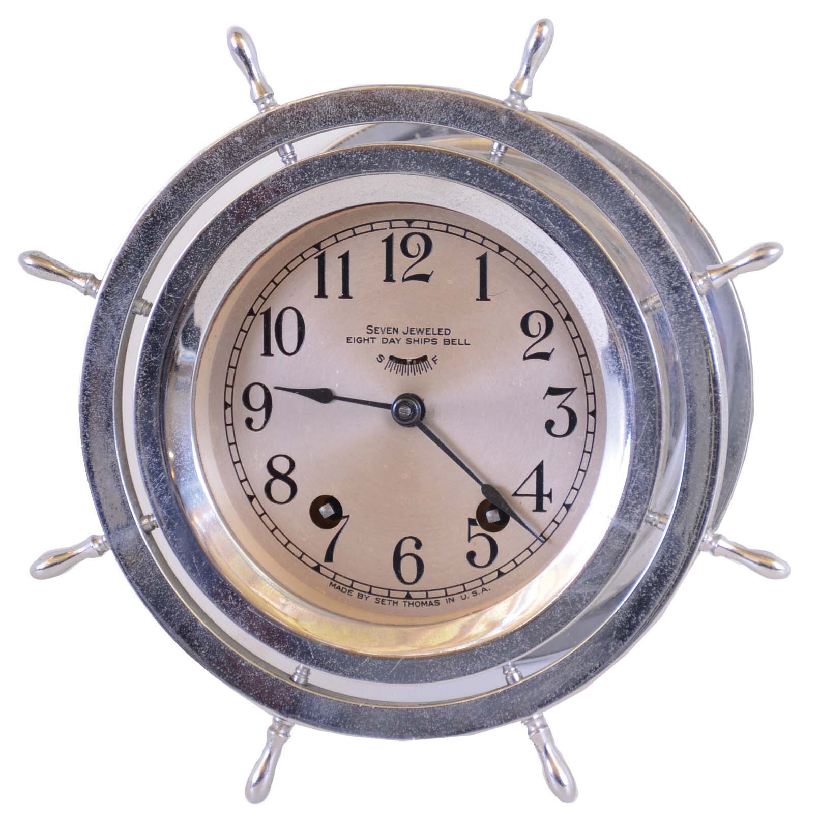 Seth Thomas Clock Co., Thomaston, Conn., "Ship's Wheel No. 44" 4.5" dial ship's bells clock in nickel plated screw- bezel case, 115A 8 day movement, c1928 — Antique Clocks Price Guide
