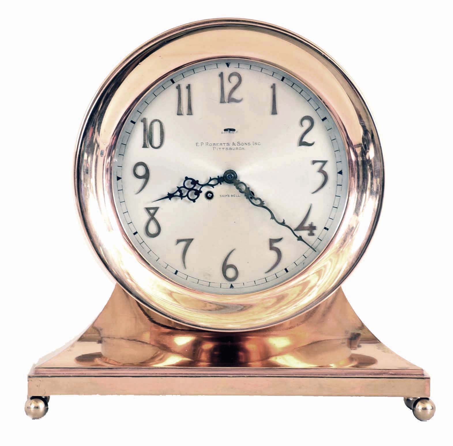 Chelsea Clock Co., Boston, Mass., Mass, a base and ball special "Commodore" ship's bell clock with ten inch dial {24.5cm}, in a red brass case with hinged bezel &amp; button latch, retailed by E. P. Roberts &amp; Sons, Pittsburgh as indicated on dial. — Antique Clocks Price Guide