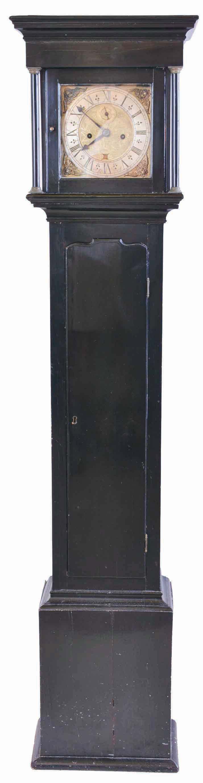 John Reid, Banff, [Scotland] dwarf tall clock, 8 day, time and bell strike, weight driven movement in a flat top ebonized pine case with brass dial with engraved dial center and corner cherub spandrels, calendar and silvered chapter ring, signed by maker — Antique Clocks Price Guide