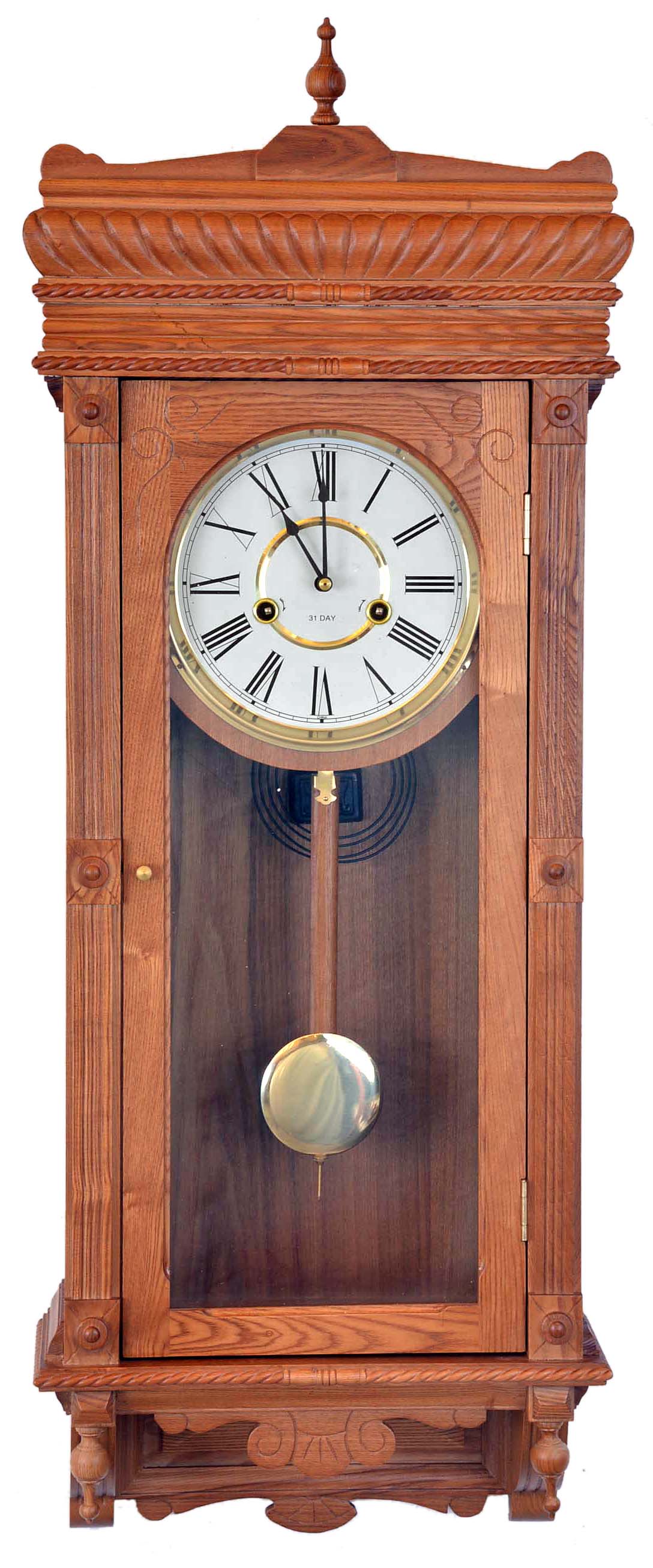 Clocks- 4 (Four): Clocks- 4 (Four): (1) Unmarked Baltimore style banjo reproduction wall clock with a spring driven movement in a wood case. c2000. (2) Unmarked reproduction of the Waterbury "Leeds" wall hanging clock with a spring driven 31 day time and strike movement in an oak case, c1980.. (3) Unmarked Baroque style wall hanging clock with a spring driven 31 day time and strike movement in an oak case c1980 (4) This clock is the same as number three (3) with the exception of the satin brass style dial, c1980. — Antique Clocks Price Guide