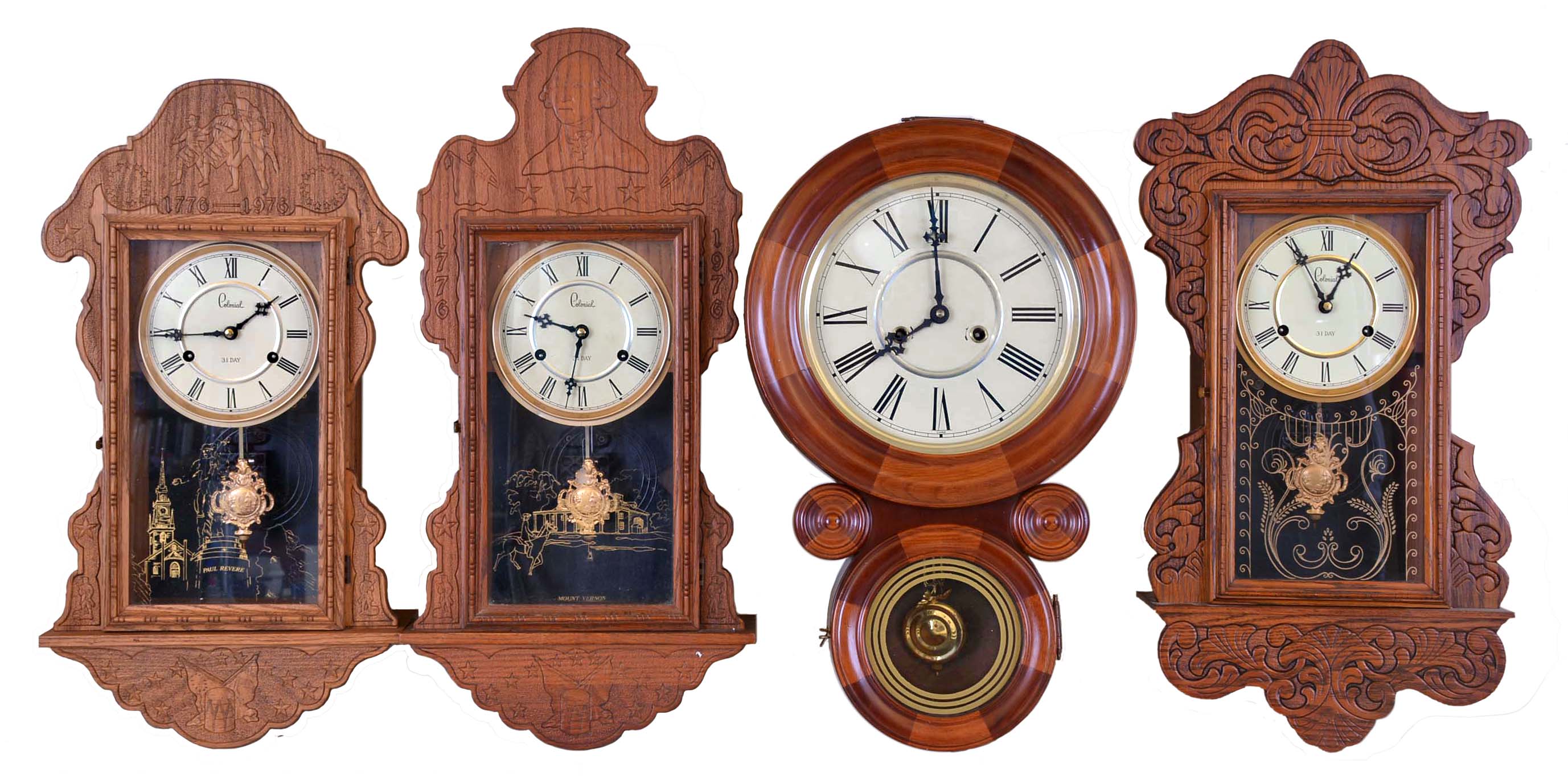 Clocks- 4 (Four): (1) Unmarked Ionic style reproduction wall clock with a spring driven movement in a mosaic wood case, c1990. (2) Colonial Mfg. Co., Zeeland, Mich., Wall hanging reproduction gingerbread clock with a 31 day time and strike movement in an oak case, c1976. (3) Colonial Mfg. Co., Zeeland, Mich., Wall hanging reproduction gingerbread clock with a 31 day time and strike movement in an oak case with an image of George Washington, c1976 (4) Colonial Mfg. Co., Zeeland, Mich., Wall hanging reproduction gingerbread clock with a 31 day time and strike movement in an oak case with an image of Colonial Soldiers marching and the term "1776- 1976", c1976. — Antique Clocks Price Guide