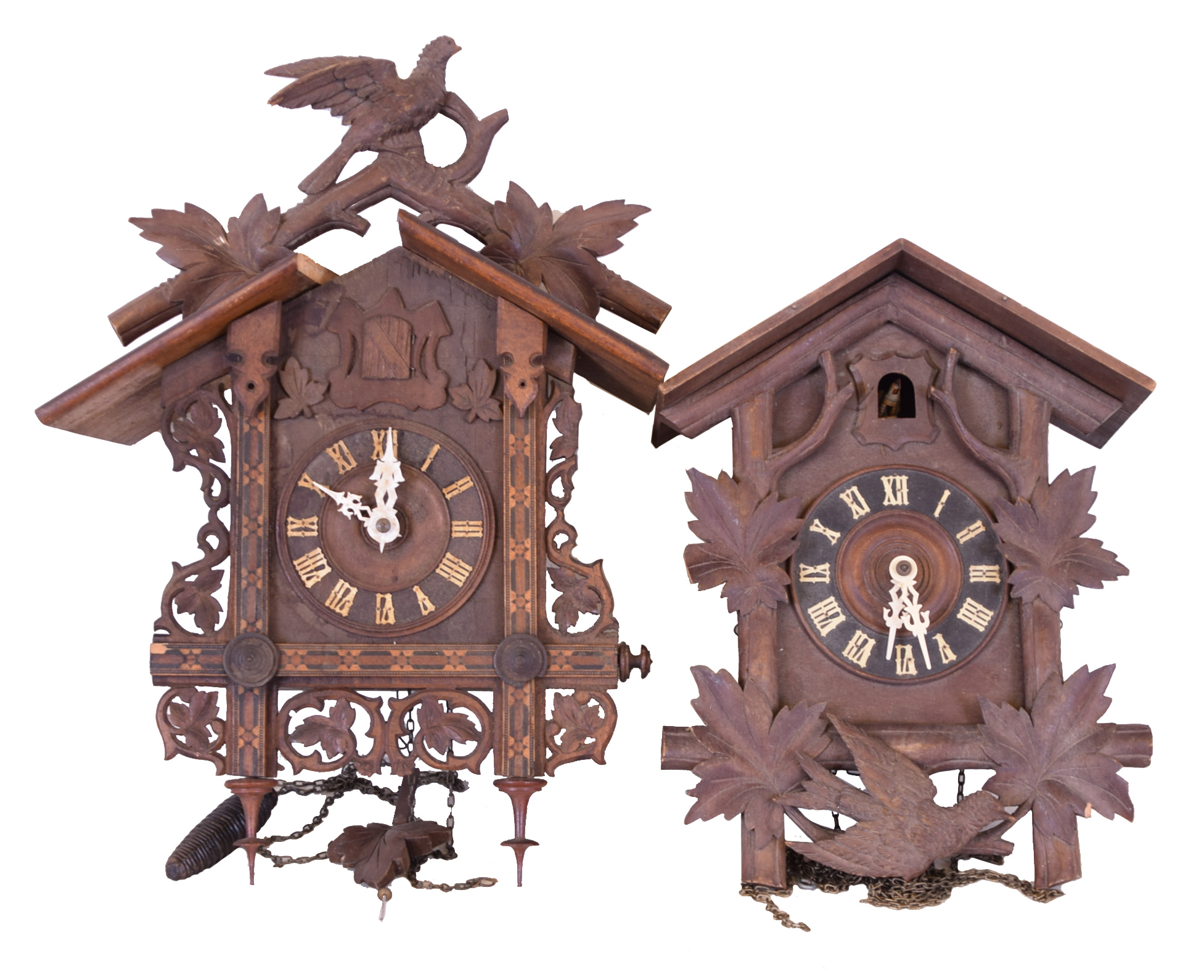 Clocks- 7 (Seven) German Cuckoo two- weight thirty- hour, 5 are larger older examples, 2 are modern — Antique Clocks Price Guide