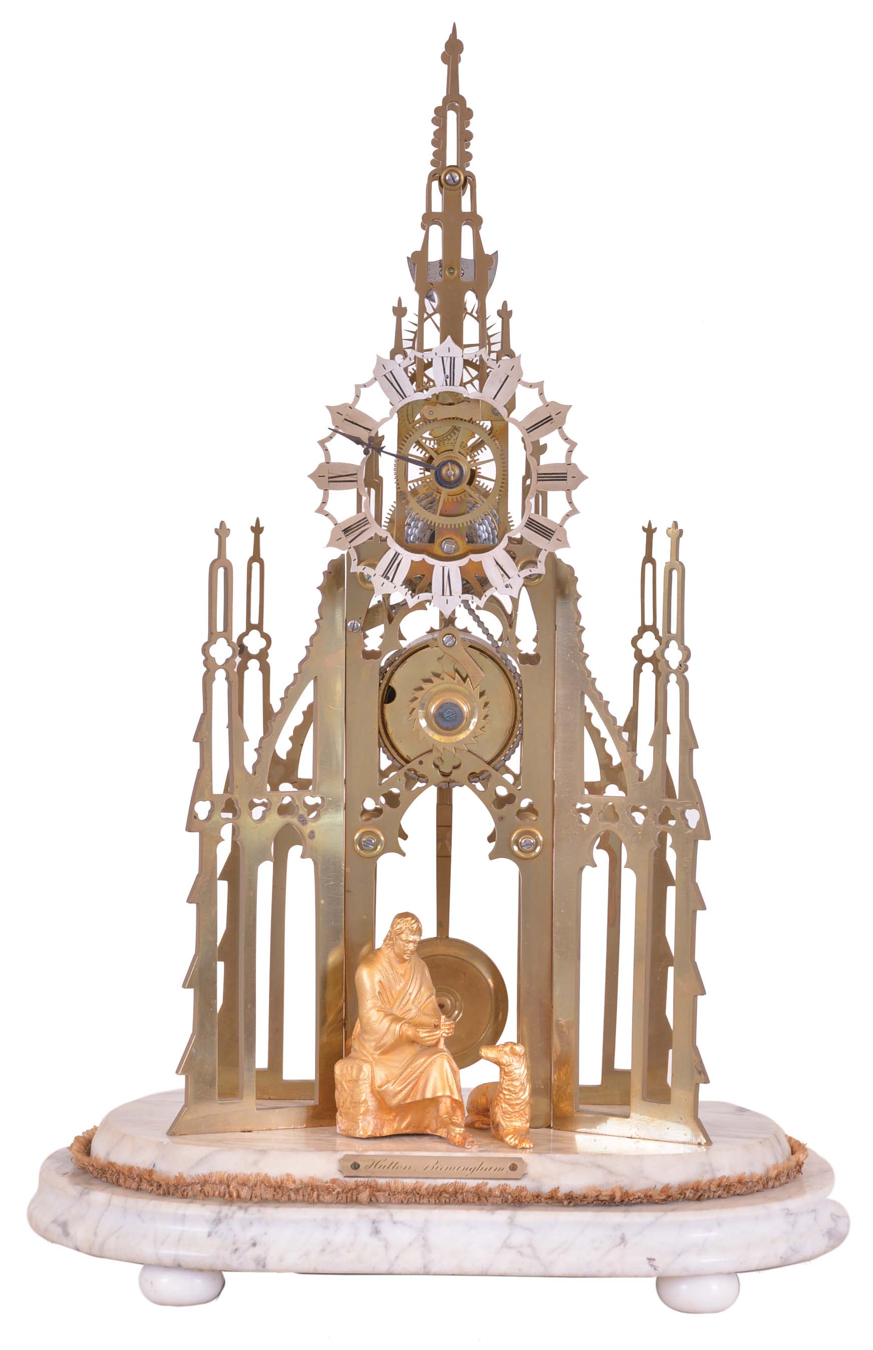 Hutton, Birmingham, Sir Walter Scott memorial skeleton clock, a seated figure of Scott and his dog before the nicely pierced and finished brass frames with Gothic tracery representing the Scott memorial at Edinburgh, Roman numeral, pierced silvered dial, blued steel hands, 8 day fusee timepiece movement with recoil escapement, and turned brass pendulum, all on a variegated white marble base with compressed ball feet — Antique Clocks Price Guide