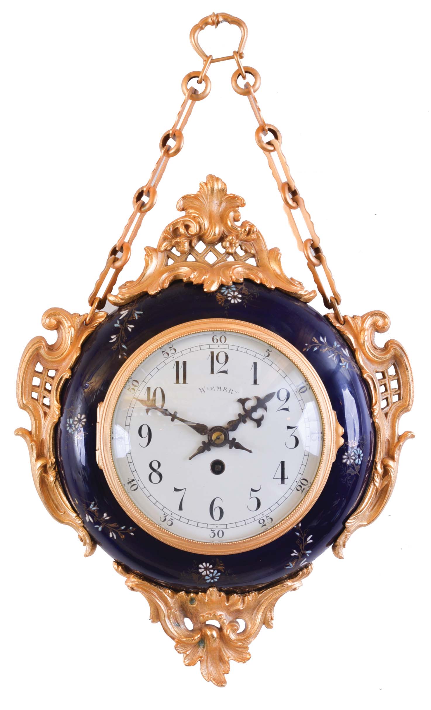 Wiemert, Paris, a two sided chatelaine clock, round, cobalt blue ceramic case with gilt and enamel foliage, and mounted with gilt naturalistic ornaments in the rococo style, gilt bezels with convex glasses, front and back with Arabic numeral white enamel dials, blued steel hands, 8 day timepiece movement with cylinder platform — Antique Clocks Price Guide