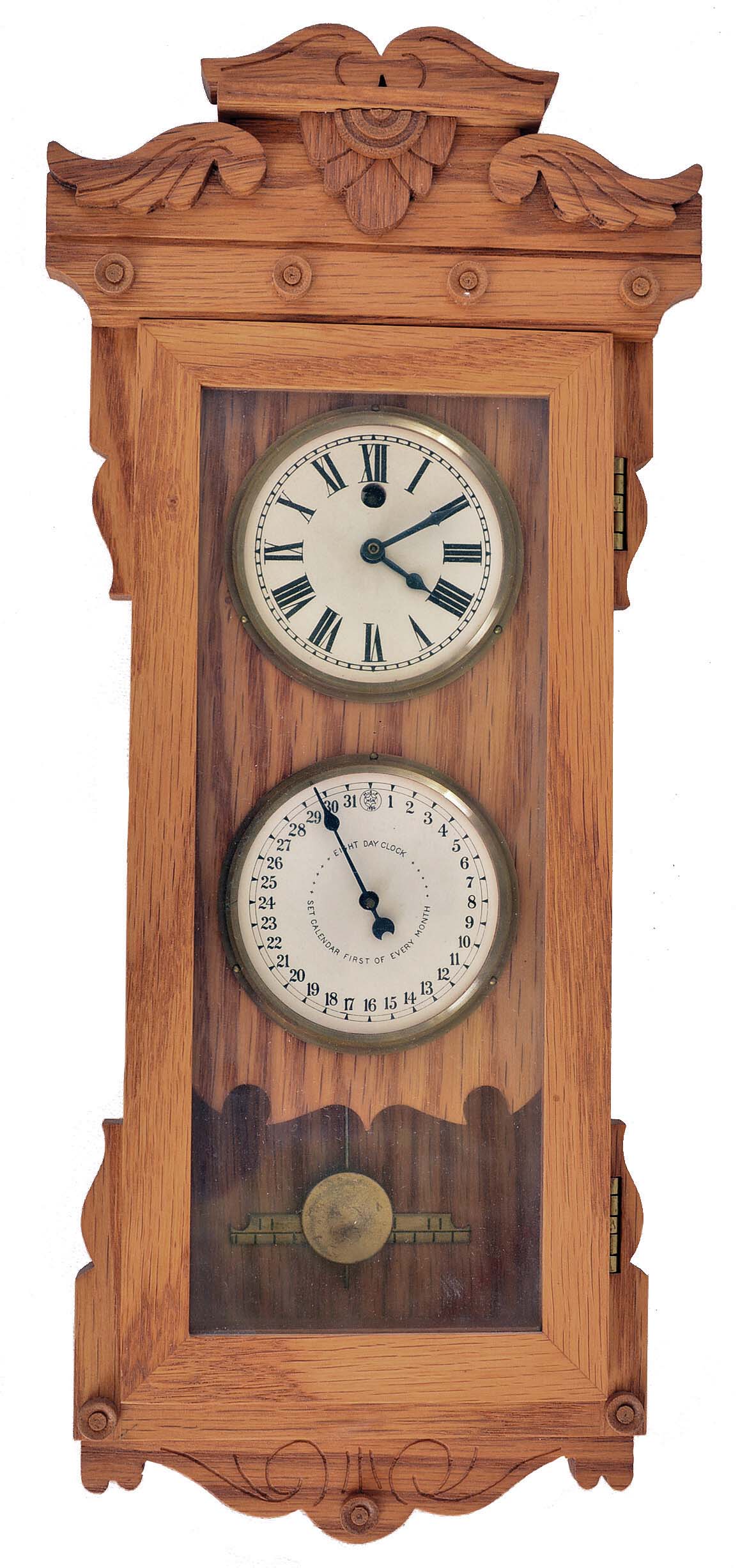 Michael Paul, Berea, Ohio, 30 hour, spring brass pendulum movement with a simple calendar miniature timepiece copy of a New Haven Clock Co. double dial calendar clock. This example is number 16 of 22. — Antique Clocks Price Guide