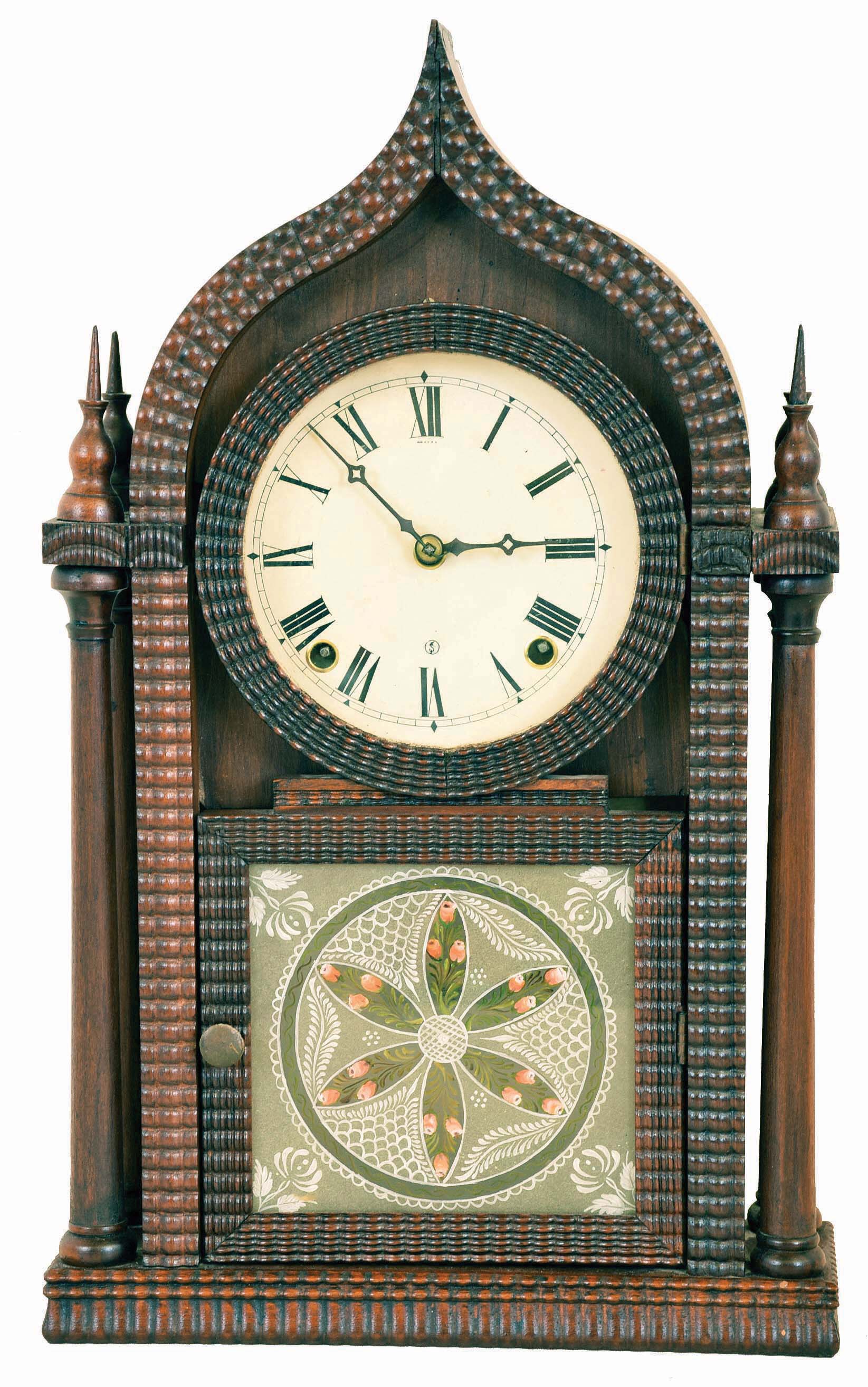 E. N. Welch, Forestville, Conn., "Oriental Gothic 4 Column" shelf clock with a spring driven 8 day time &amp; strike brass movement in a ripple front rosewood case with mahogany columns. — Antique Clocks Price Guide