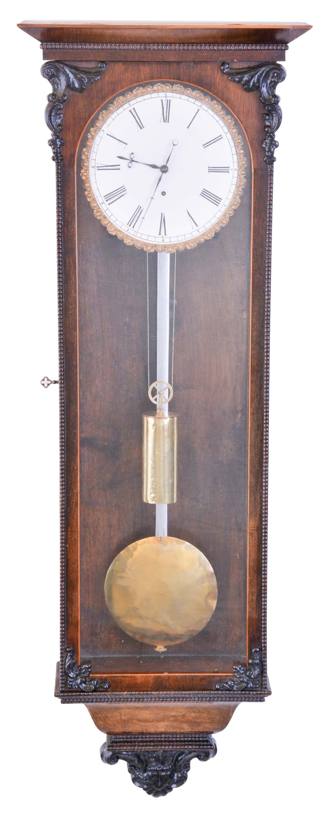 Austria, month going regulator in the Biedermeier style, rosewood veneered case with contrasting fine banding and beveled cornice molding, ripple moldings and applied, cast ornaments, one piece Roman numeral enamel dial with well cast &amp; gilt bezel, finely cut blued steel hands, 30 day timepiece movement, brass pendulum with steel rod, and brass weight — Antique Clocks Price Guide