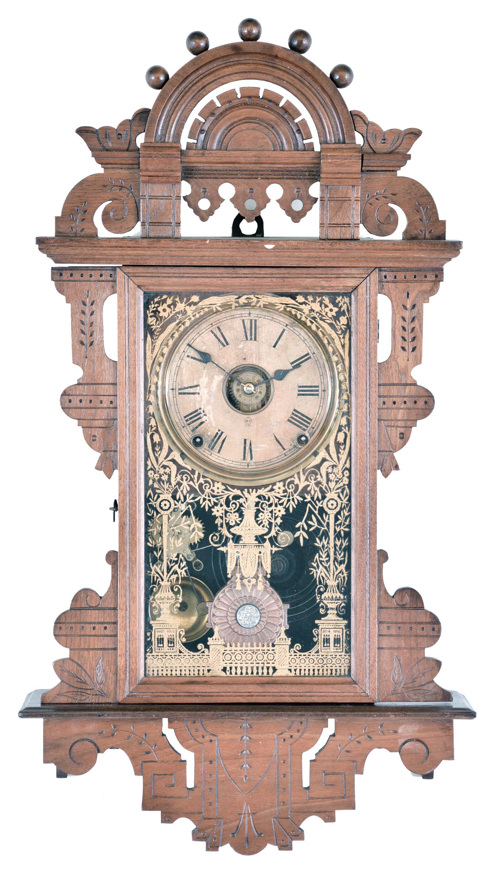 Seth Thomas Clock Co., Thomaston, Conn., "Eclipse" wall hanging clock with a spring driven 8 day time, strike and outboard alarm in a walnut case, c. 1890. — Antique Clocks Price Guide