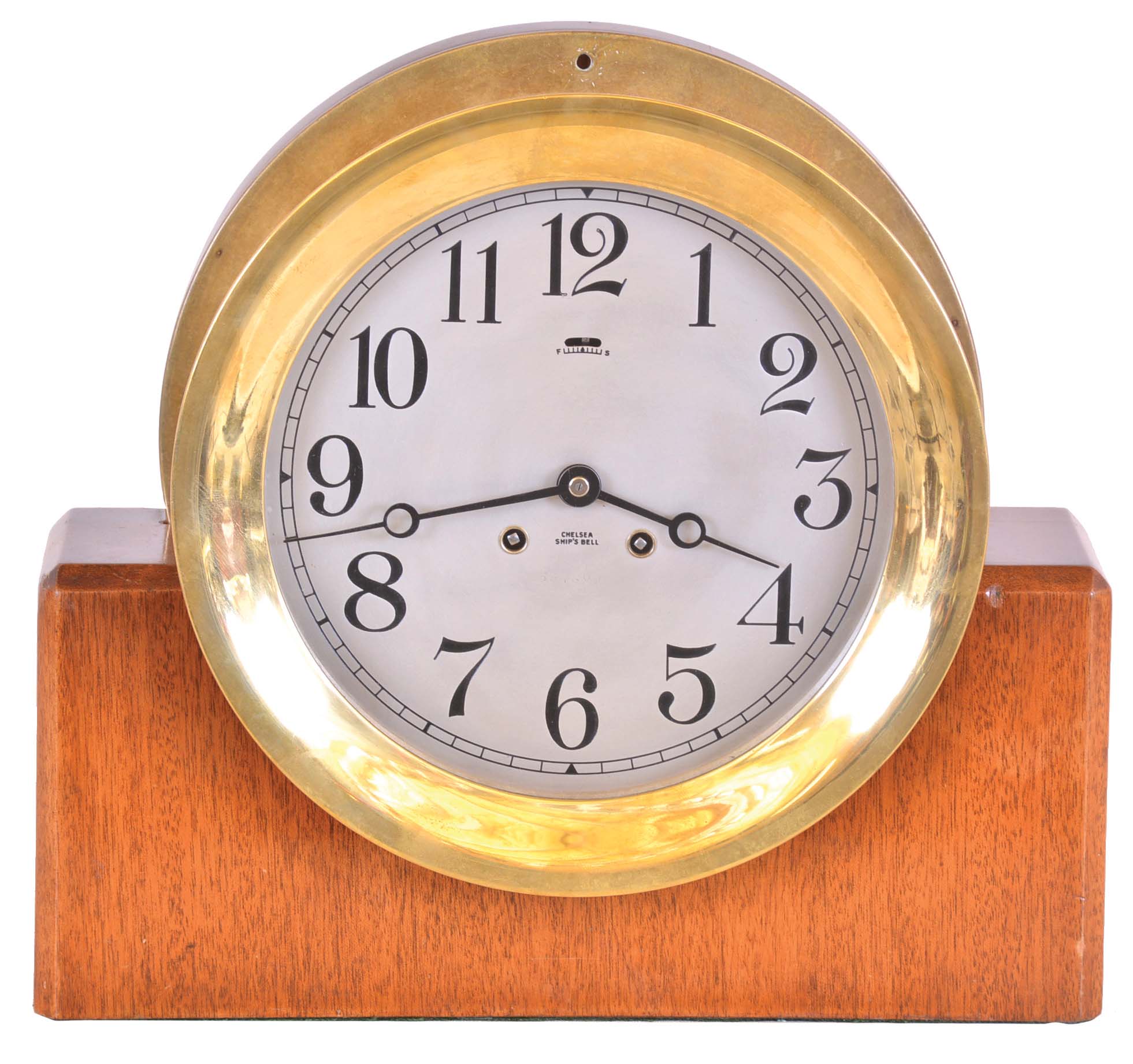 Chelsea Clock Co., Boston, Mass., 8 inch ships bell clock with custom made mahogany stand, cast brass case, Arabic numeral silvered dial, steel moon hands, 8 day lever movement with ships bell striking, serial No. 527160 — Antique Clocks Price Guide