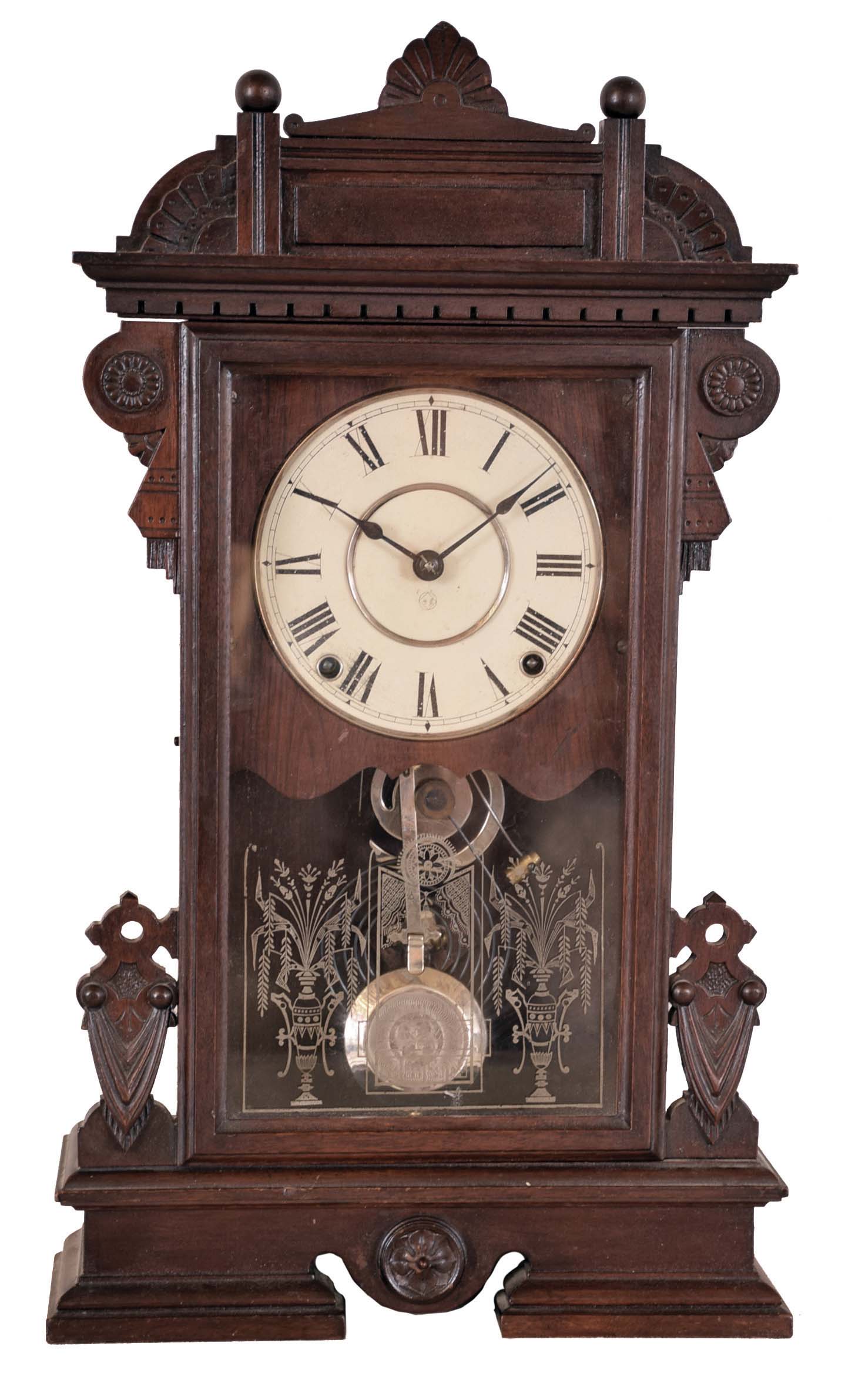 Seth Thomas Clock Co., Thomaston, Conn., "Ogden" model City Series shelf clock with an 8 day spring driven time and strike lyre movement in a walnut case. — Antique Clocks Price Guide