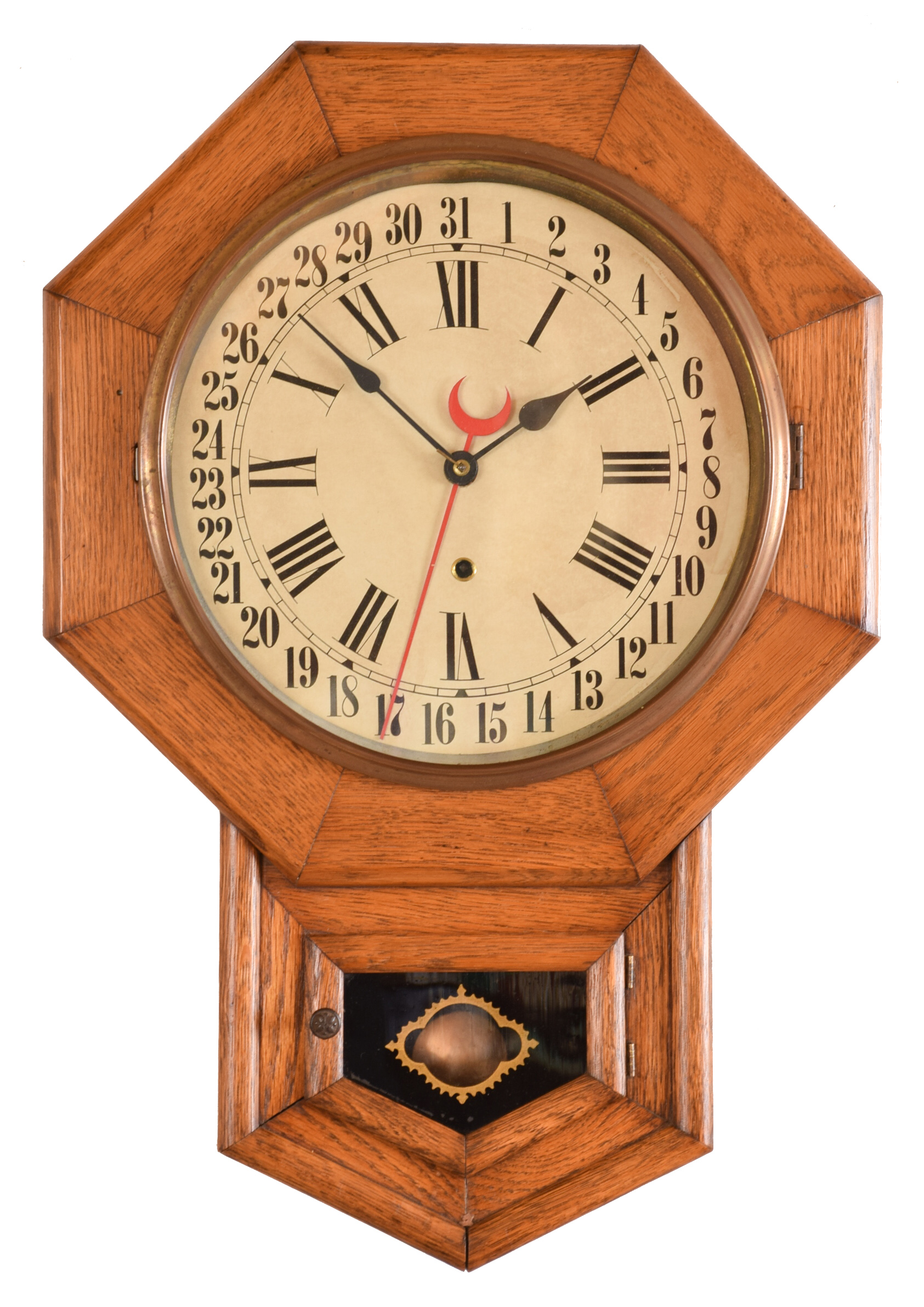 Clocks- 2 (Two): (1) New Haven Clock Co., New Haven, Conn. "Drop Octagon" wall hanging clock with an 8 day spring driven timepiece movement with a simple calendar mechanism in an oak case, c1900. (2) Waterbury Clock Co., Waterbury, Conn., "Drop Octagon" wall hanging clock with an 8 day spring driven timepiece movement in a mahogany and rosewood veneer case, c1874. — Antique Clocks Price Guide