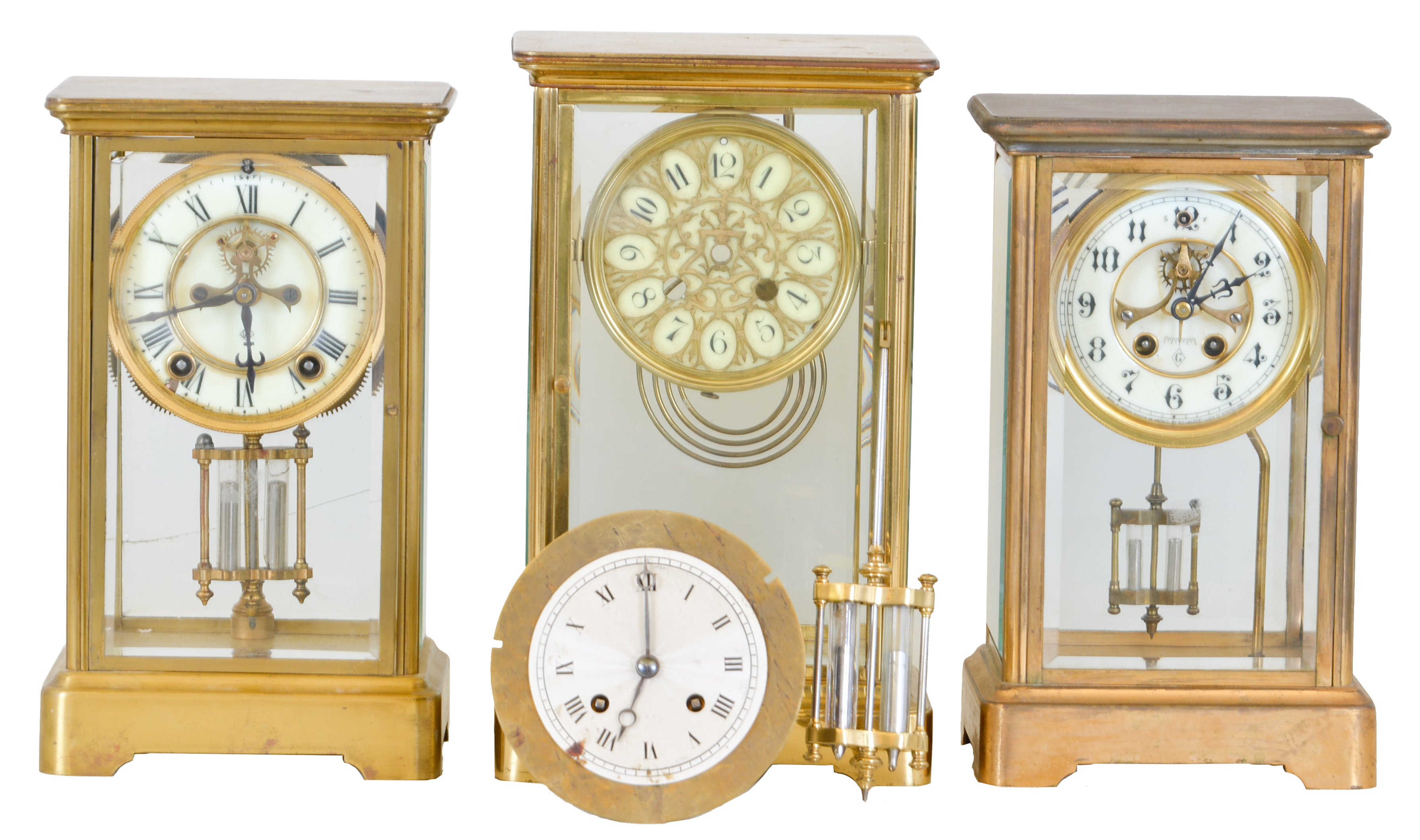 Clocks- 3 (Three): (1) Ansonia Clock Co., New York, NY, "Prism", 8 day, time and strike spring brass movement crystal regulator mantel clock, c1914 (2) French, 8 day, time and strike spring brass movement crystal regulator mantel clock, c1900 (3) William L. Gilbert Clock Co., Winsted, Conn., "Vista", 8 day, time and strike spring brass movement crystal regulator mantel clock, c1913 — Antique Clocks Price Guide