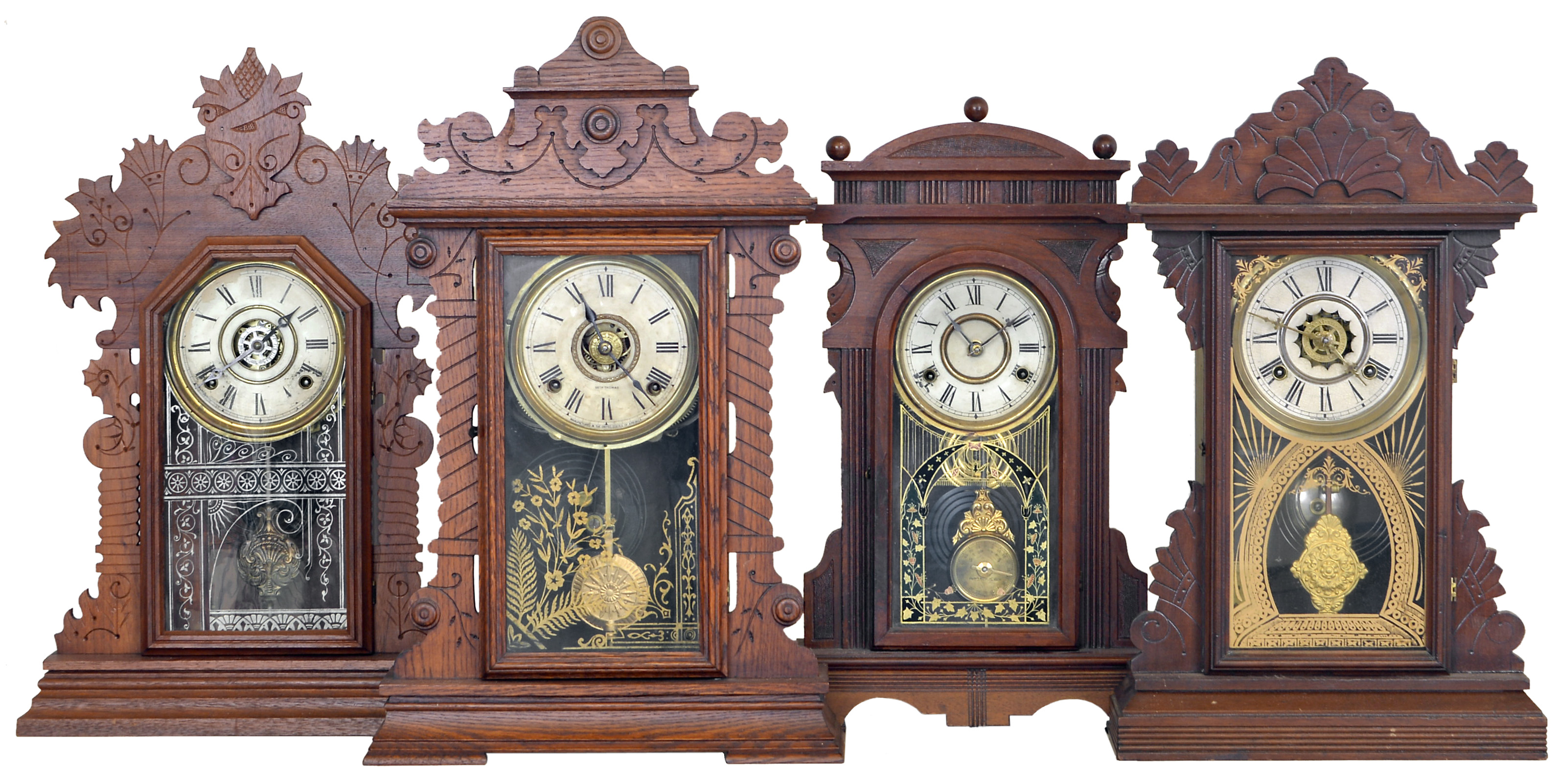 Clocks- 4 (Four): (1) E. Ingraham &amp; Co., Bristol, Conn., "Sun", 8 day, time, strike and alarm spring brass movement shelf clock, c1891 (2) Waterbury Clock Co., Waterbury, Conn., 8 day, time, strike and alarm brass movement shelf clock, c1885 (3) New Haven Clock Co., New Haven, Conn., "Arno", 8 day, time and strike spring brass movement shelf clock, c1883 (4) Seth Thomas Clock Co., Thomaston, Conn., 8 day, time, strike and alarm spring brass movement shelf clock, c1880 — Antique Clocks Price Guide