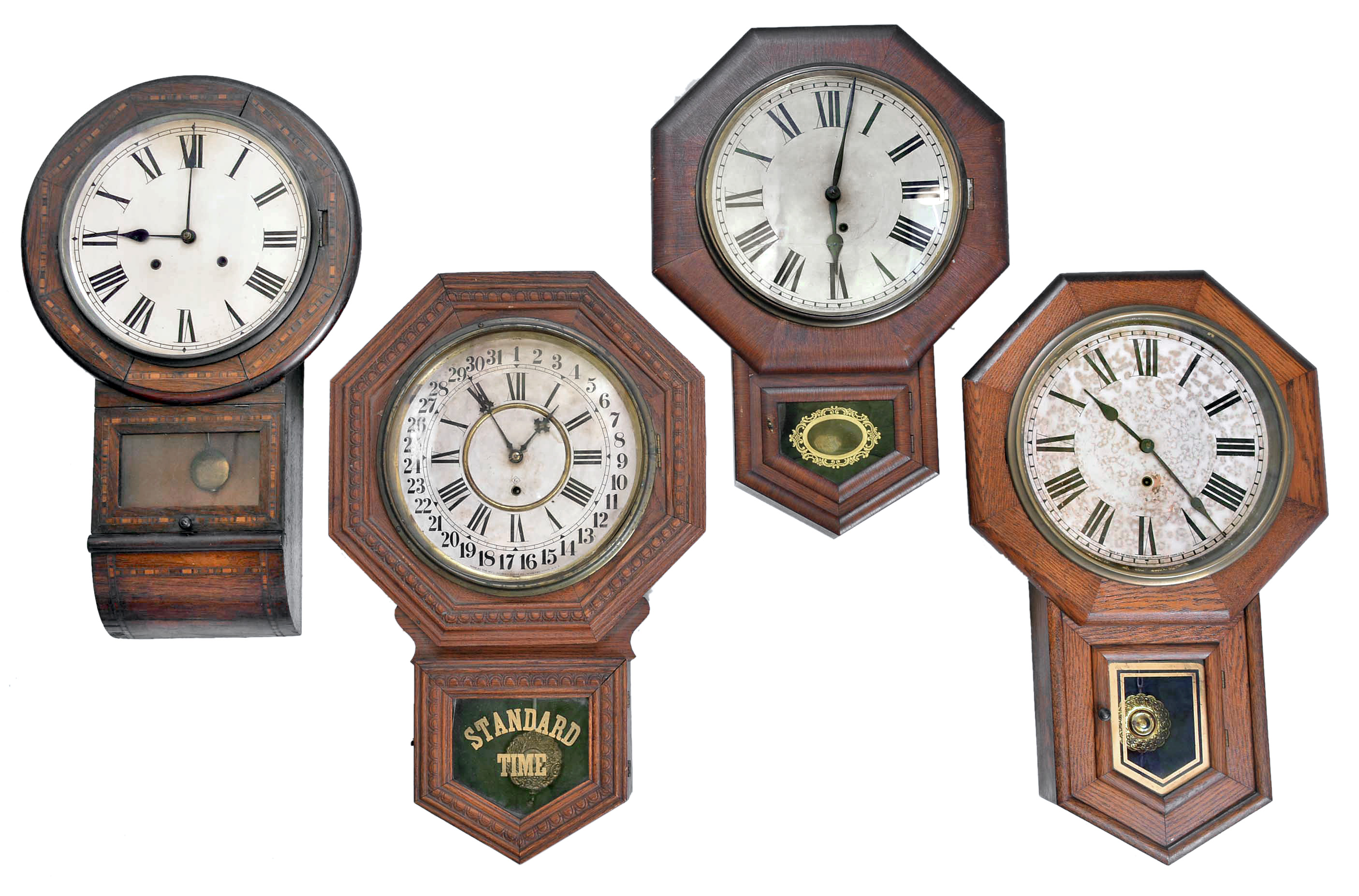 Clocks- 4 (Four): (1) Sessions Clock Co., Forestville, Conn., "Clinton", 8 day, spring brass movement drop octagon wall timepiece, c1908 (2) Ansonia Clock Co., New York, NY, 8 day, spring brass movement drop octagon wall timepiece, c1910 (3) Anglo-American, 8 day, time and strike spring brass movement long drop wall clock, c1900 (4) William L. Gilbert Clock Co., Winsted, Conn., "Admiral", 8 day, spring brass movement drop octagon calendar wall timepiece, c1910 — Antique Clocks Price Guide