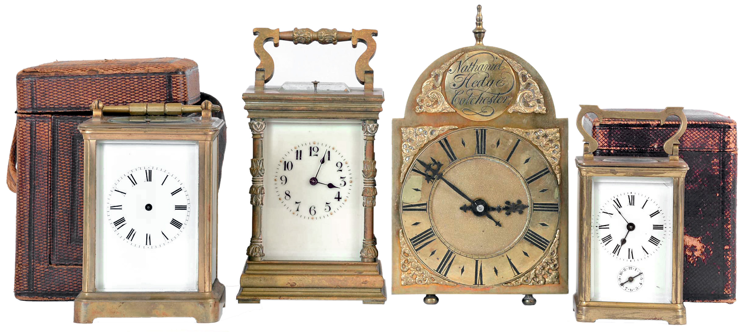 Clocks- 4 (Four), three carriage clocks, two with 8 day time and strike, hour repeating movements, one a timepiece with alarm, and a miniature lantern clock style desk clock with 8 day time and strike movement — Antique Clocks Price Guide