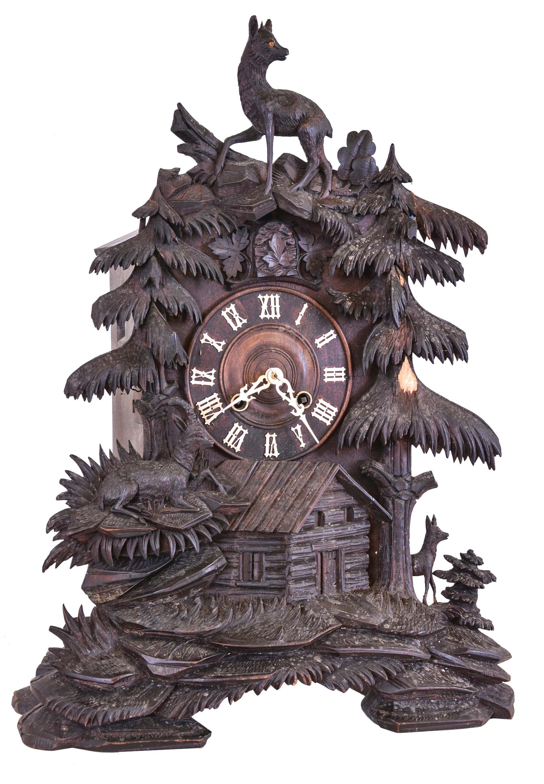 Germany, large shelf cuckoo, the case carved with Alpine landscape incorporating a cabin, trees and various animals, turned wooden dial with applied Roman numerals, 8 day, two train brass spring driven movement, the strike train with a fusee — Antique Clocks Price Guide