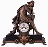 France, a large figural mantel clock, stepped black slate base with bronzed paw feet, laurel molding, and central cartouche with lion mask, supporting the clock case with seated, pensive knight in chain mail and with his sword and dagger, also in a bronze finish, two piece Roman numeral white enamel dial with exposed Brocot escapement, blued steel Breguet style hands, and 8 day time and strike pendule de Paris movement