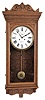 Sessions Clock Co., Forestville, Conn., "Regulator No. 5" wall hanging clock with an 8 day weight driven brass timepiece movement in a sold oak case.