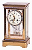 French, Marti & Cie, 8 day, time and strike spring brass movement crystal regulator with enameled decoration.
